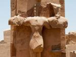 Egyptian statue modified to form a Christian cross