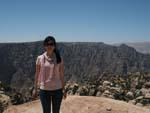 Dana Reserve - Sonya at the edge of a mountain