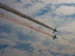 Military aircraft with smoke trails