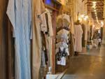 Tradition cloths for sale in on of the Souk Waqif hallways